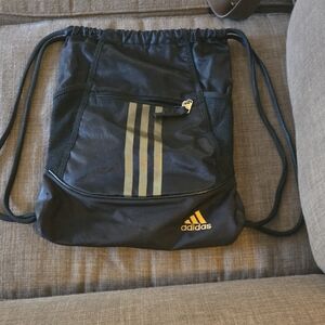 adidas Black Drawstring Backpack with Gold Stripe Accents